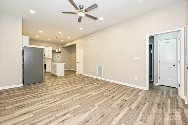 a view of a livingroom with a hardwood floor