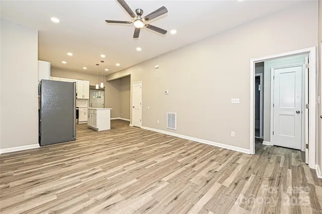 a view of a livingroom with a hardwood floor