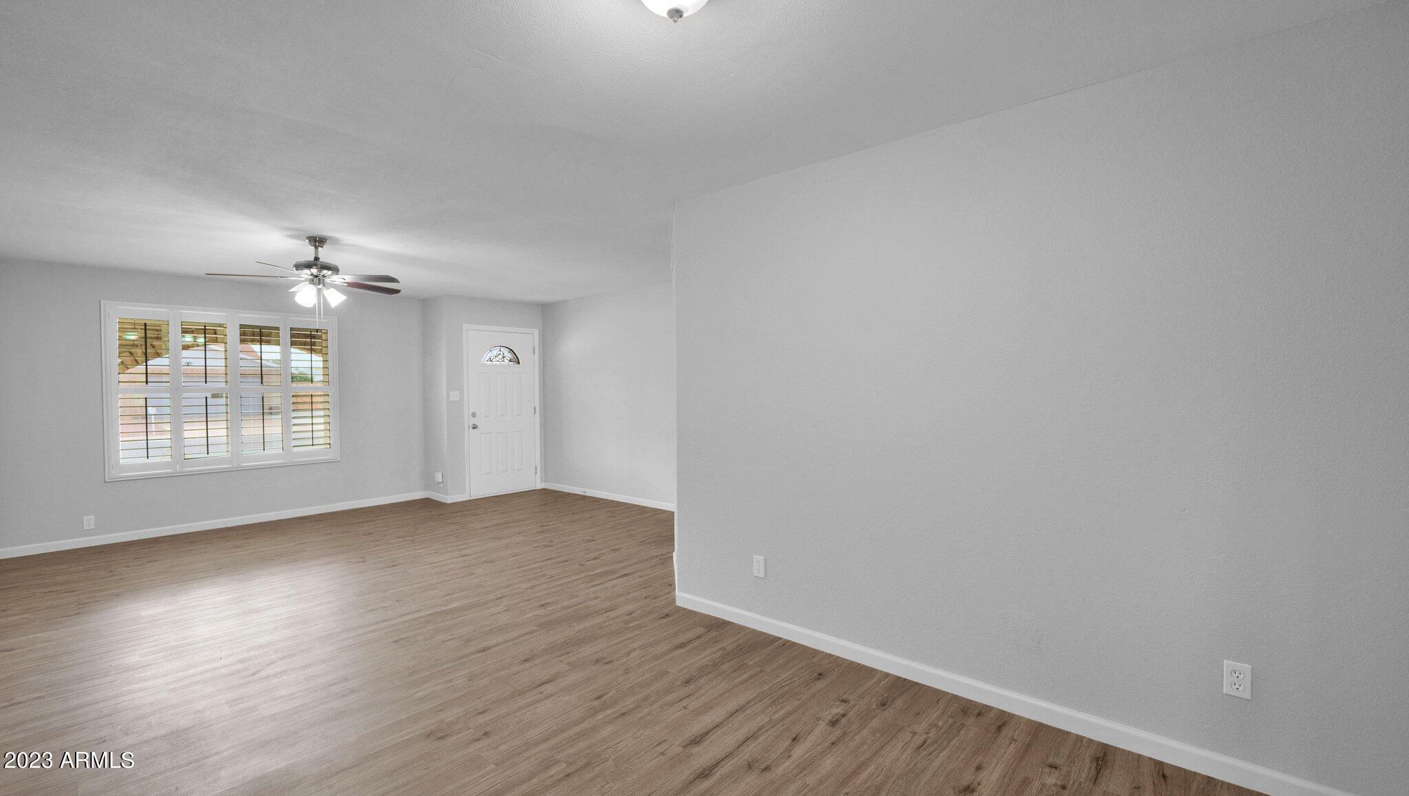 3730 West Grandview Road Phoenix, AZ 85053 - Photo 16 of 30 056 Dining Area to Living Room