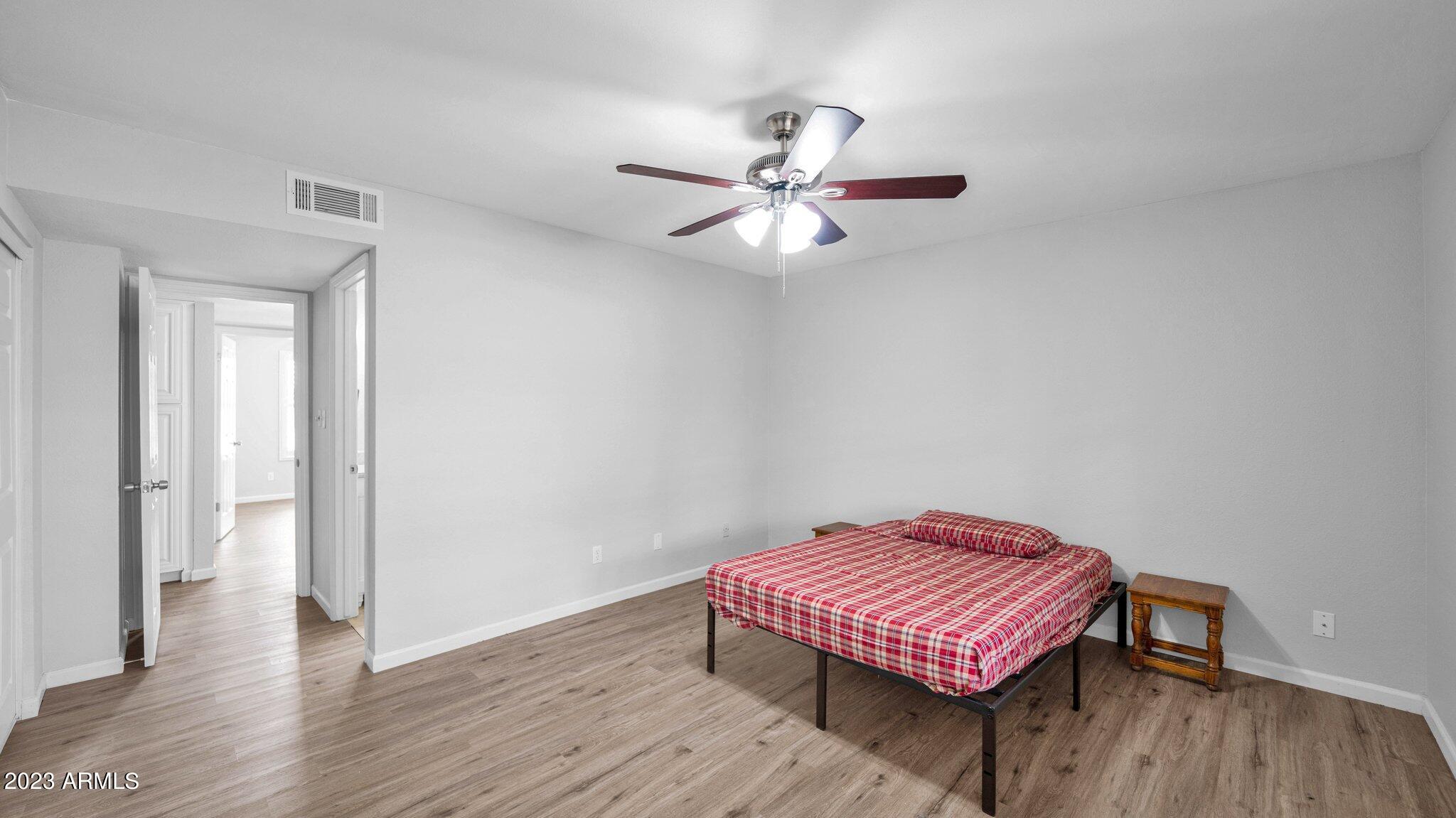 3730 West Grandview Road Phoenix, AZ 85053 - Photo 18 of 30 061 Primary Bedroom