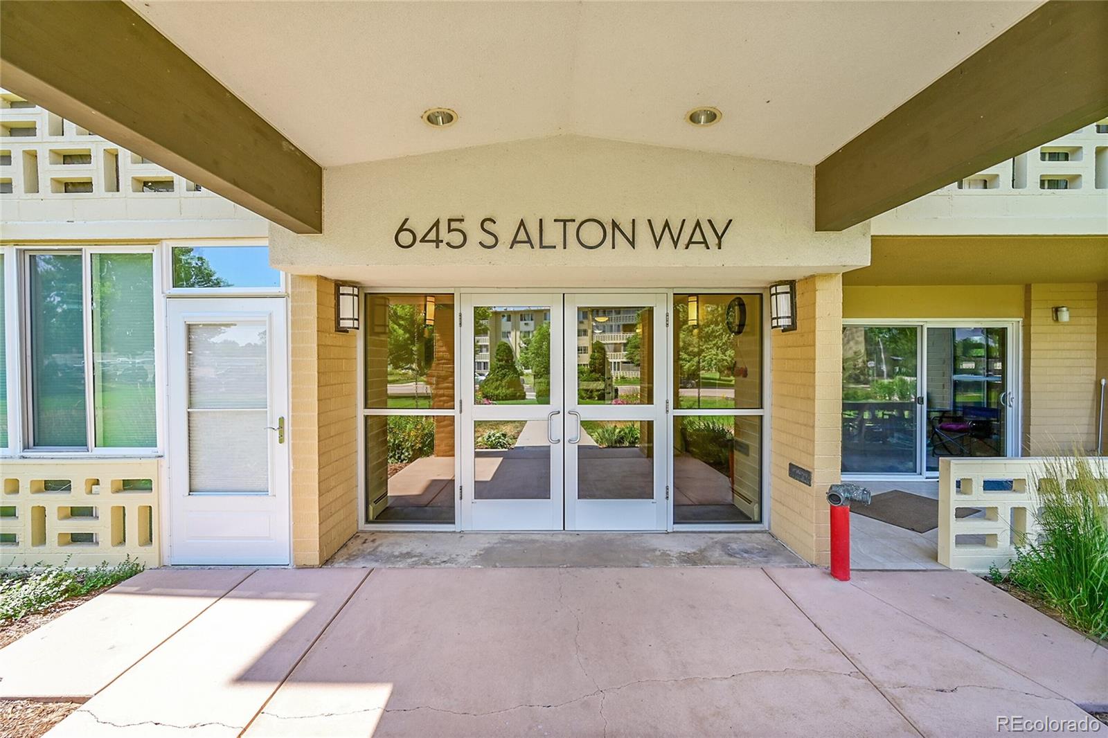 645 South Alton Way, Unit 9D Denver, CO 80247 - Photo 26 of 29 a view of a building with entrance