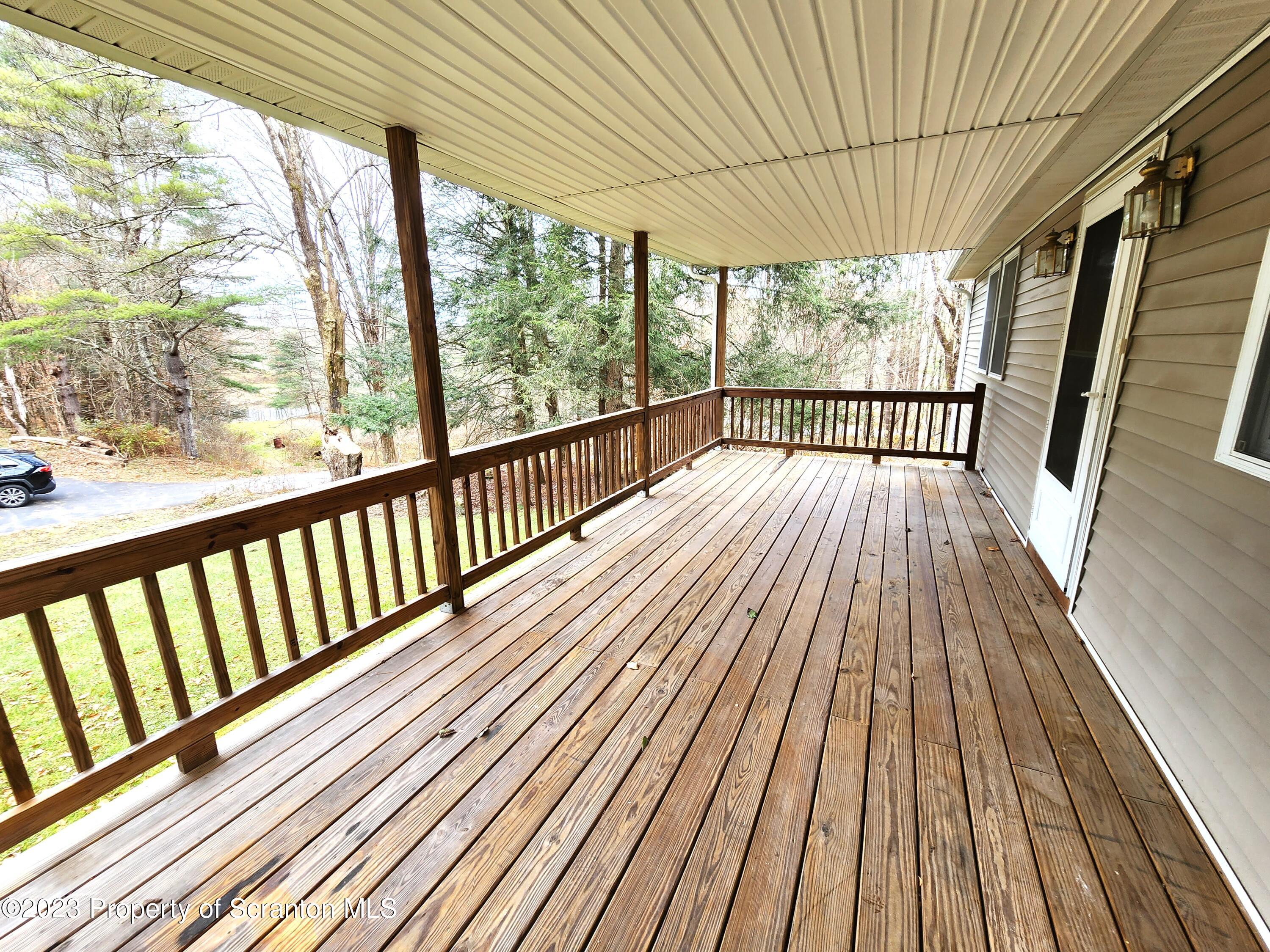 1575 State Rte 2009 Nicholson, PA 18446 - Photo 38 of 54 a view of balcony with wooden floor