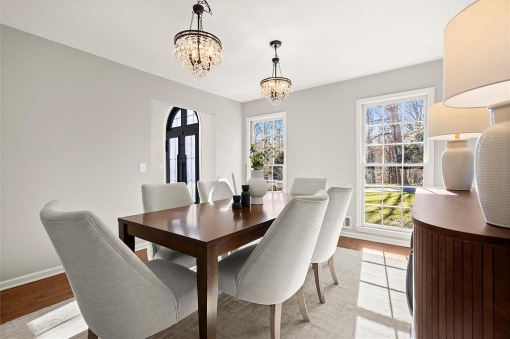 4367 Moss Ridge Court Northeast Roswell, GA 30075 - Photo 12 of 84 a view of a dining room with furniture window and outside view