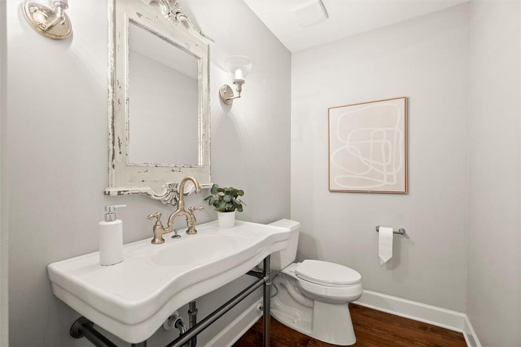 4367 Moss Ridge Court Northeast Roswell, GA 30075 - Photo 20 of 84 a bathroom with a sink toilet and a mirror