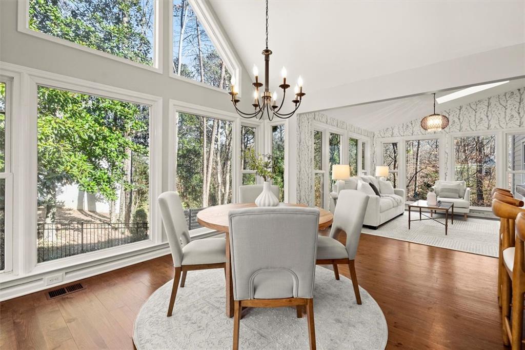 4367 Moss Ridge Court Northeast Roswell, GA 30075 - Photo 30 of 84 a view of a dining room with furniture window and wooden floor