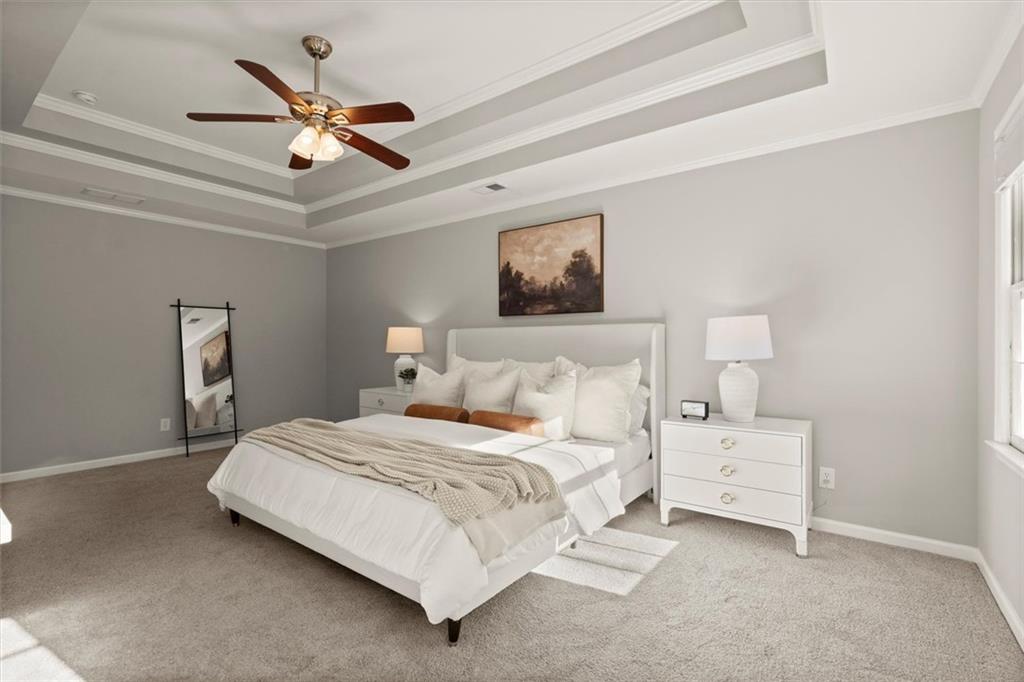 4367 Moss Ridge Court Northeast Roswell, GA 30075 - Photo 38 of 84 a bedroom with a bed and a painting on the wall