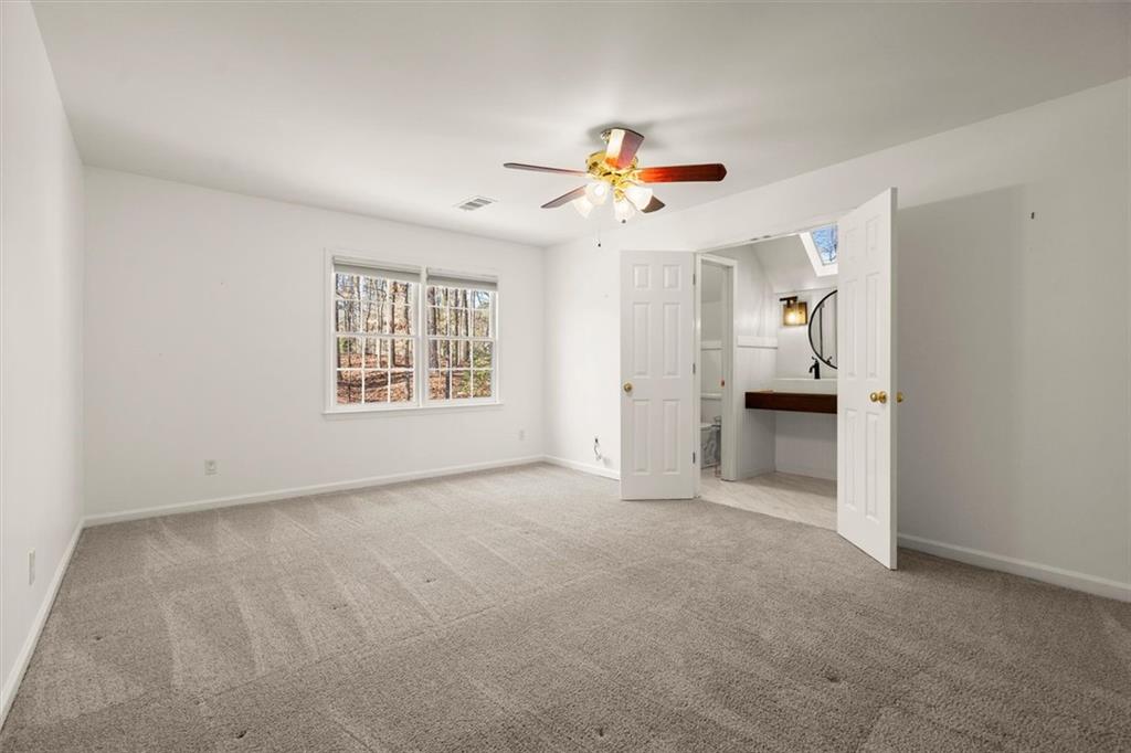 4367 Moss Ridge Court Northeast Roswell, GA 30075 - Photo 52 of 84 a view of an empty room with a window