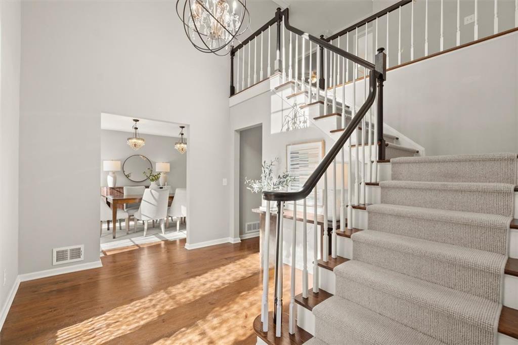4367 Moss Ridge Court Northeast Roswell, GA 30075 - Photo 6 of 84 a view of entryway and hall with wooden floor