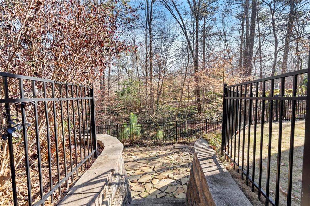 4367 Moss Ridge Court Northeast Roswell, GA 30075 - Photo 73 of 84 a view of balcony with wooden floor and fence
