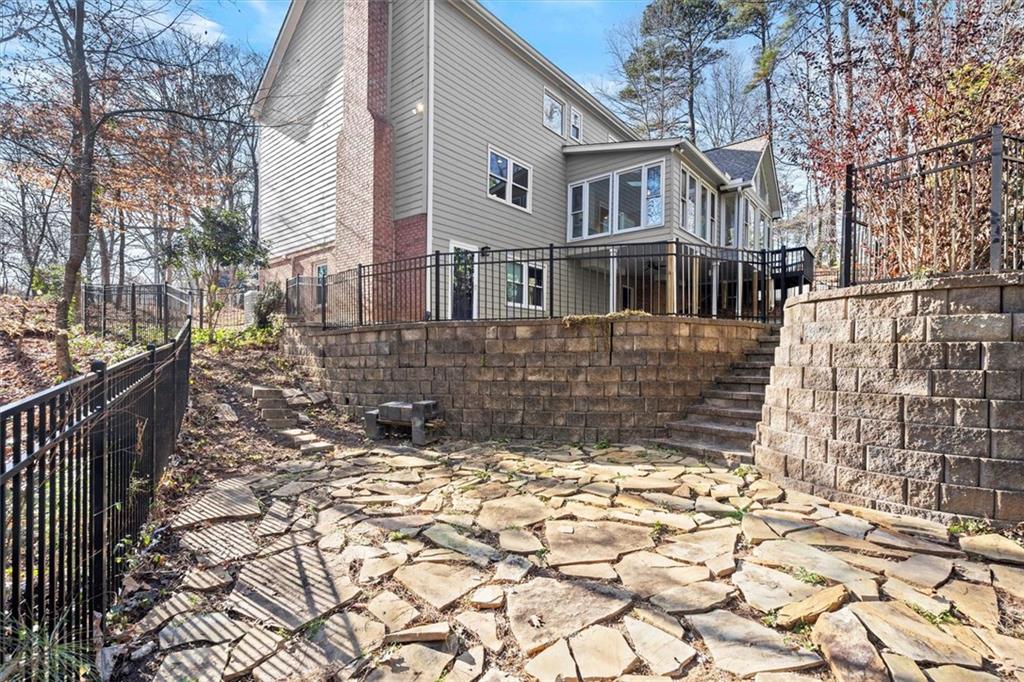 4367 Moss Ridge Court Northeast Roswell, GA 30075 - Photo 74 of 84 a view of a house with a yard