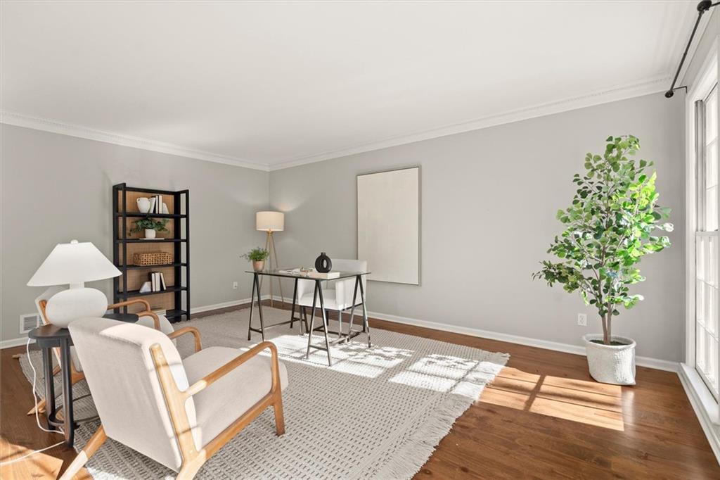 4367 Moss Ridge Court Northeast Roswell, GA 30075 - Photo 8 of 84 a living room with furniture and a potted plant