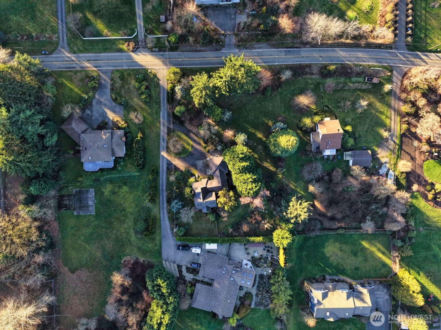 16414 104th Avenue Northeast Bothell, WA 98011 - Photo 13 of 16 an aerial view of a house with a yard basket ball court and outdoor seating