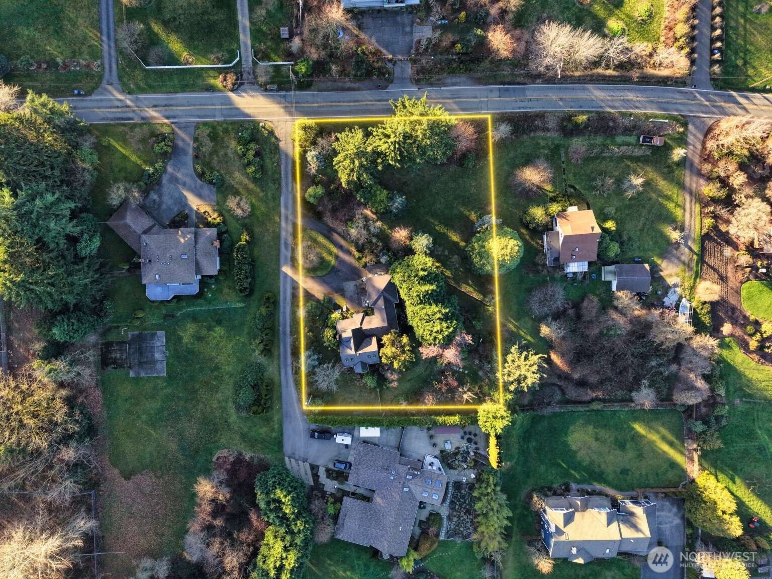 16414 104th Avenue Northeast Bothell, WA 98011 - Photo 14 of 16 an aerial view of a house with a yard and a large tree