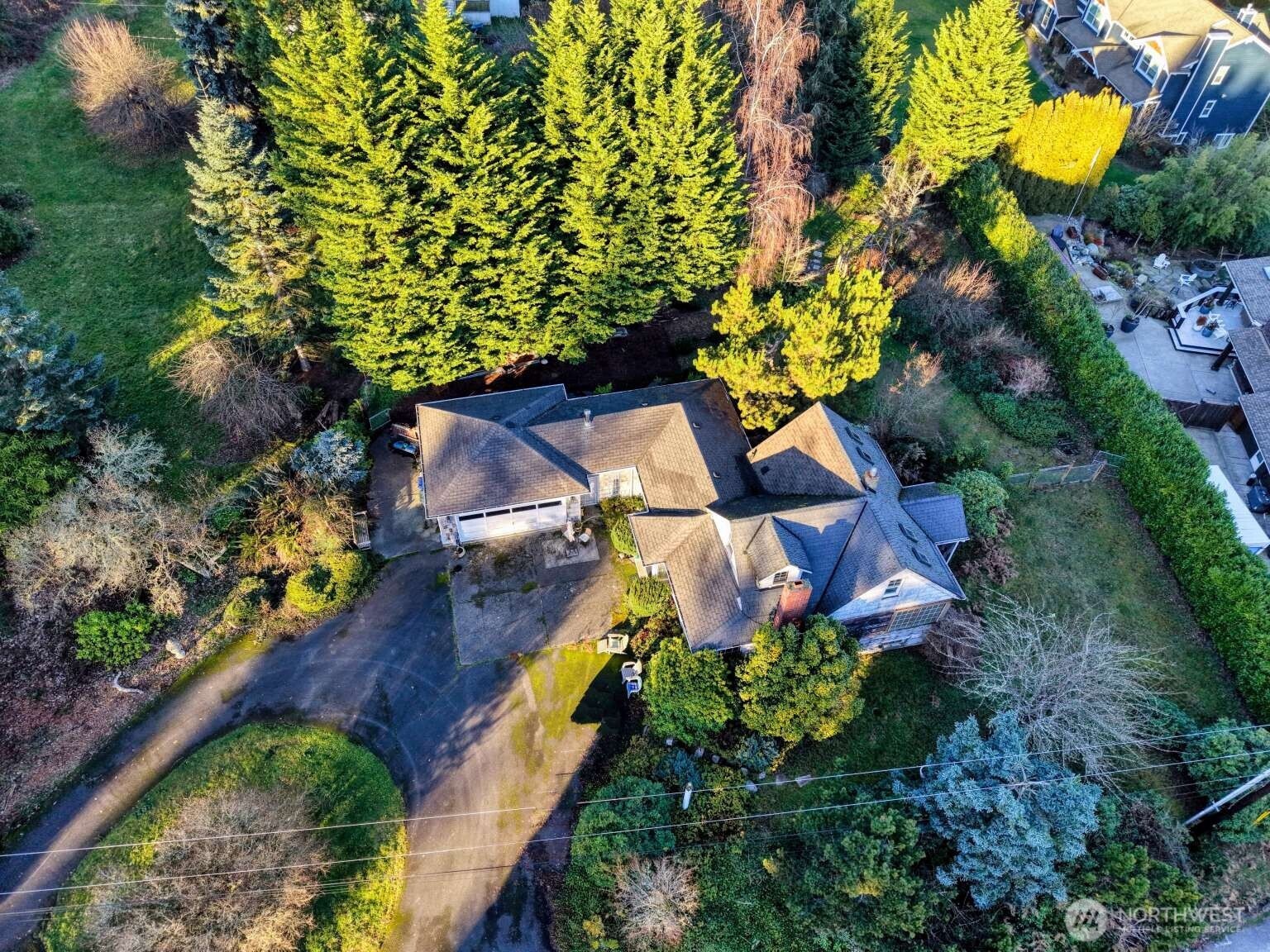 16414 104th Avenue Northeast Bothell, WA 98011 - Photo 10 of 16 an aerial view of a house with a yard sitting area