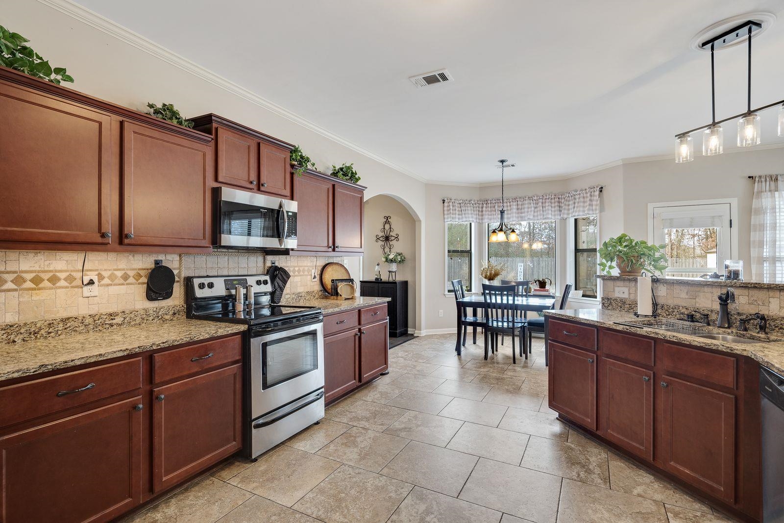 6247 Willow Walk Way Arlington, TN 38002 - Photo 11 of 40 a kitchen with lots of counter top space and appliances