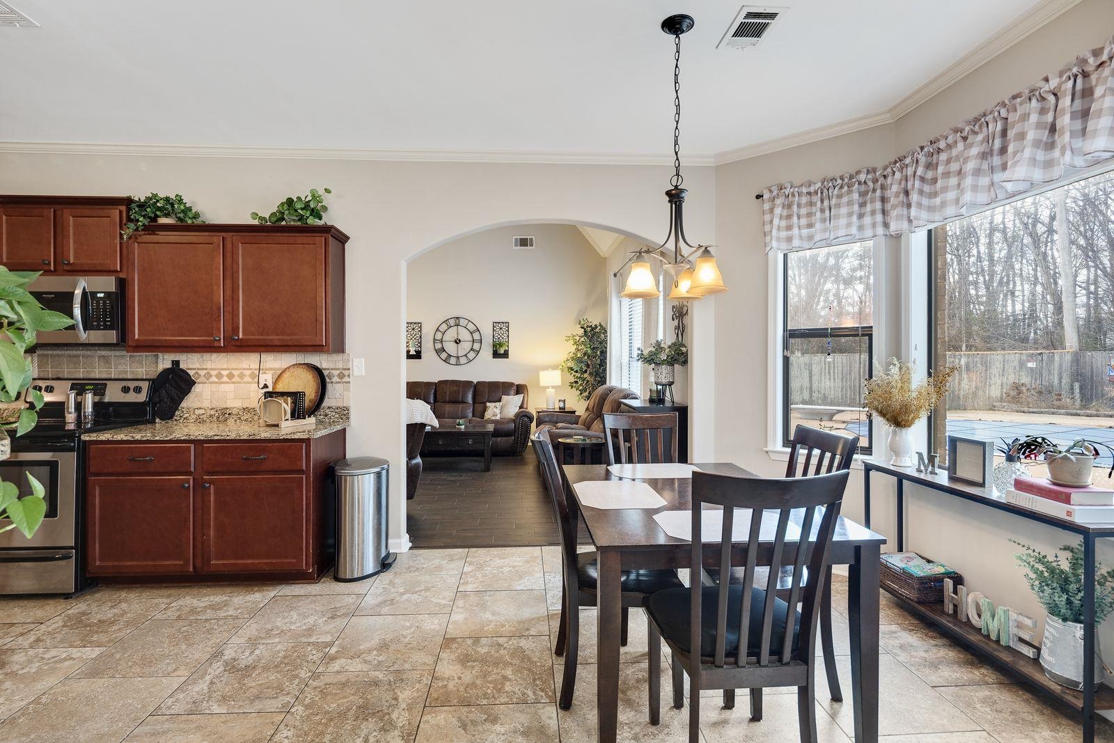 6247 Willow Walk Way Arlington, TN 38002 - Photo 15 of 40 a view of a dining room with furniture window and outside view