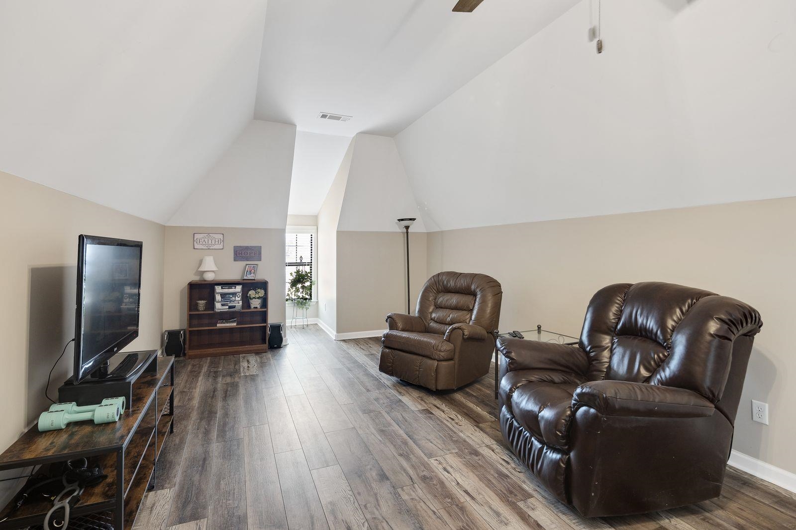 6247 Willow Walk Way Arlington, TN 38002 - Photo 30 of 40 a living room with furniture and a flat screen tv