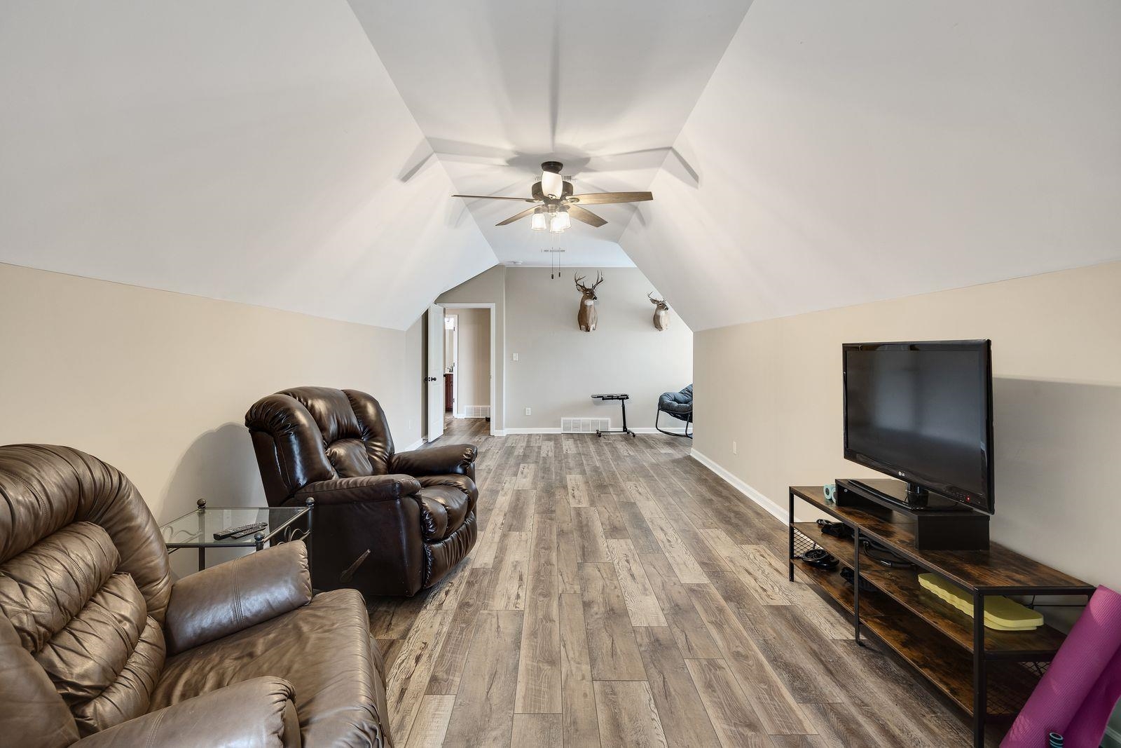 6247 Willow Walk Way Arlington, TN 38002 - Photo 31 of 40 a living room with furniture and a flat screen tv