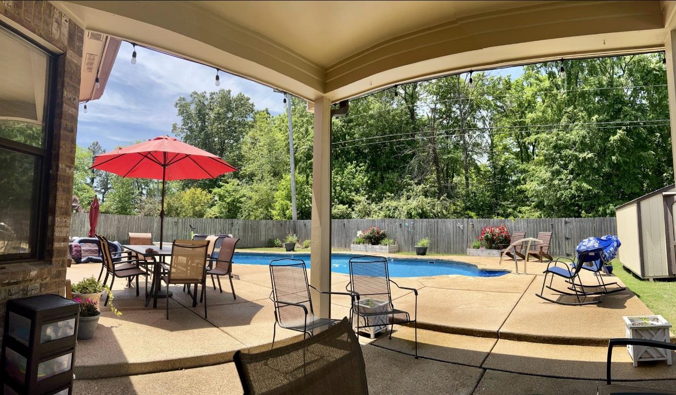 6247 Willow Walk Way Arlington, TN 38002 - Photo 32 of 40 a patio with a table and chairs