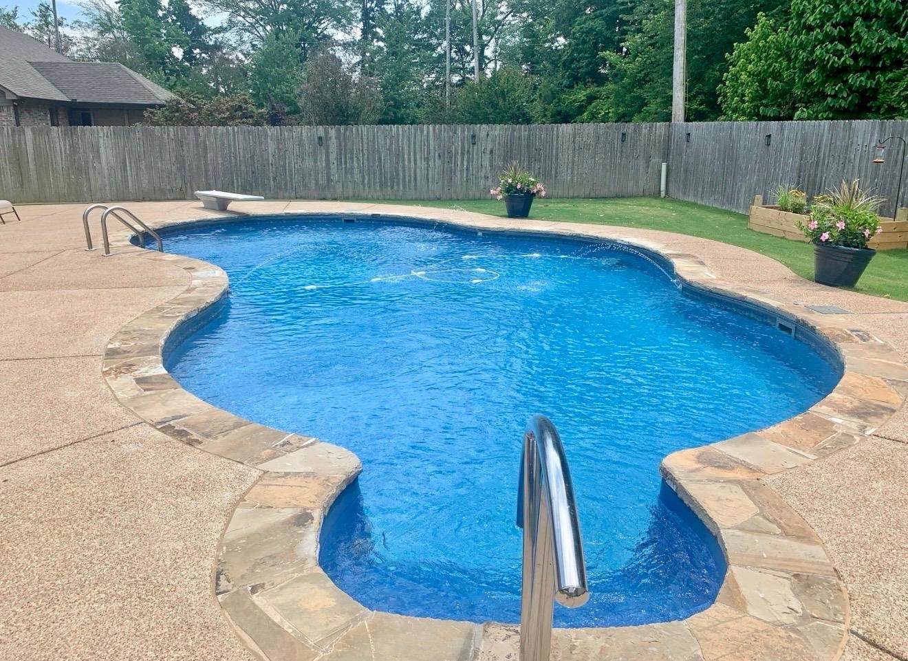 6247 Willow Walk Way Arlington, TN 38002 - Photo 35 of 40 a view of a swimming pool in the backyard