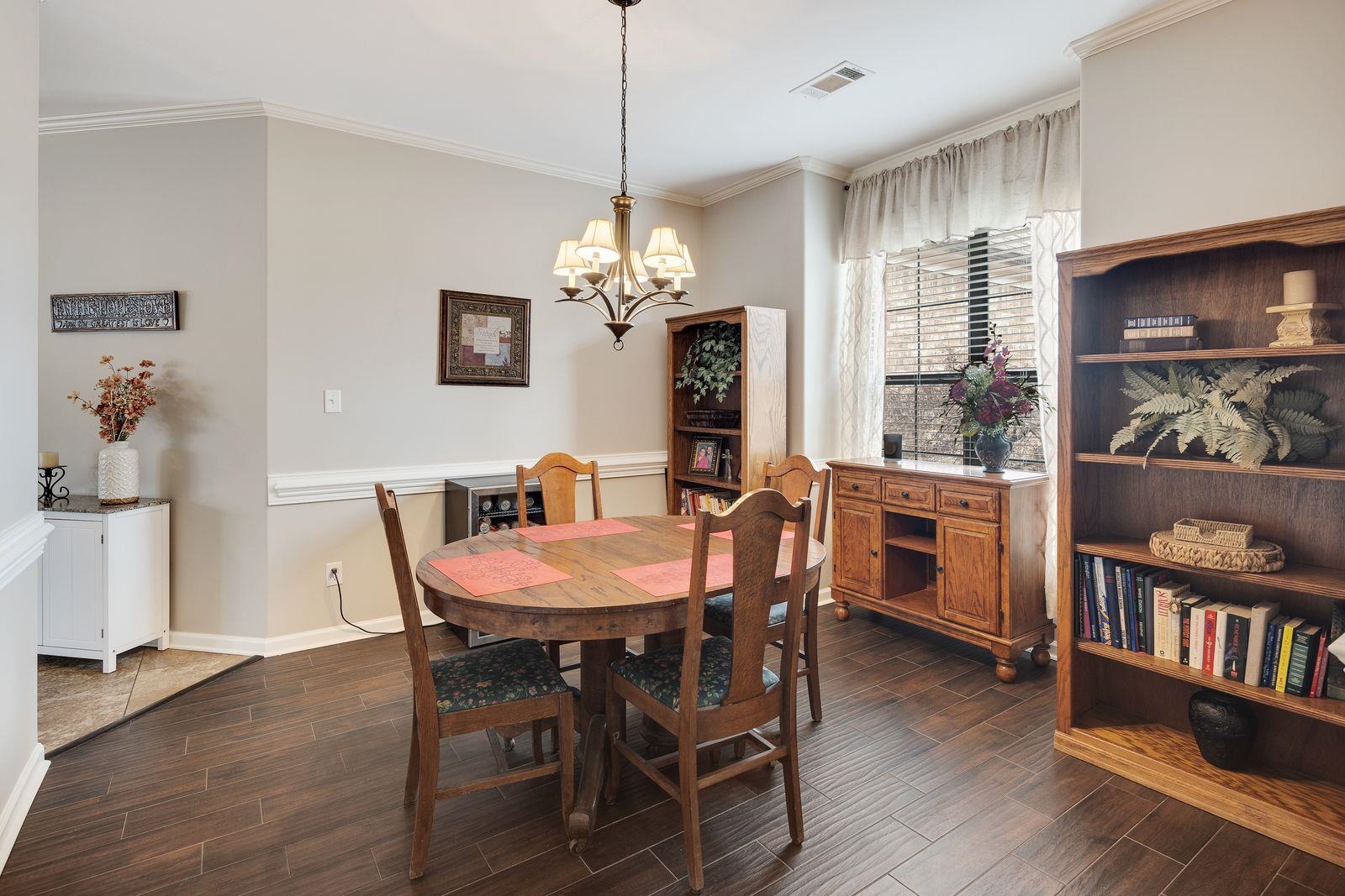 6247 Willow Walk Way Arlington, TN 38002 - Photo 10 of 40 a view of a dining room with furniture and wooden floor