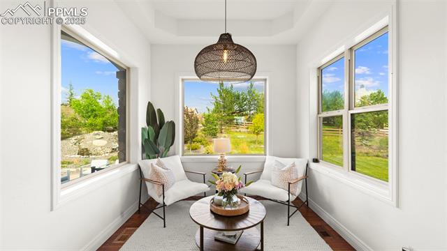 13625 Random Ridge View Colorado Springs, CO 80921 - Photo 13 of 50 Sunroom with healthy amount of natural light