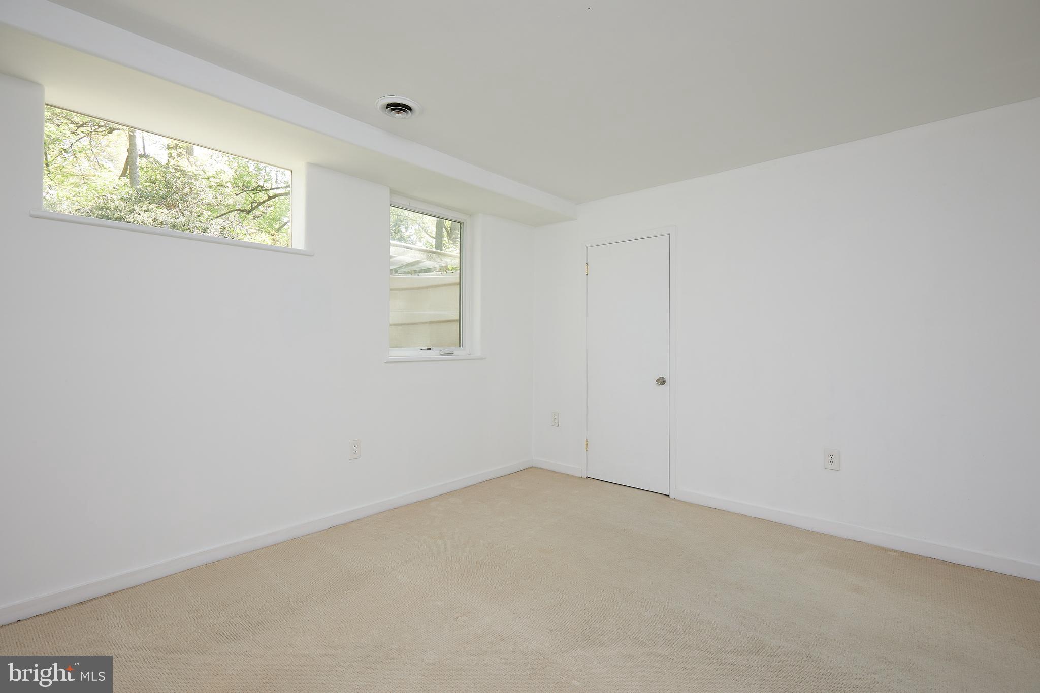 11530 Highview Avenue Silver Spring, MD 20902 - Photo 21 of 27 Lower levellarge bedroom with walk-in closet
