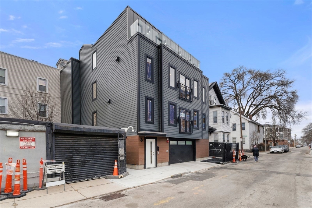 6 Devine Way, Unit 2 Boston, MA 02127 - Photo 29 of 39 a street view with tall buildings and a street