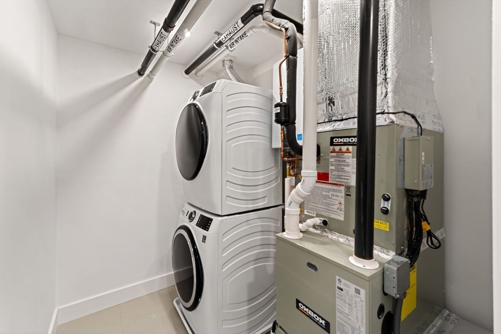 6 Devine Way, Unit 2 Boston, MA 02127 - Photo 39 of 39 a utility room with dryer and washer