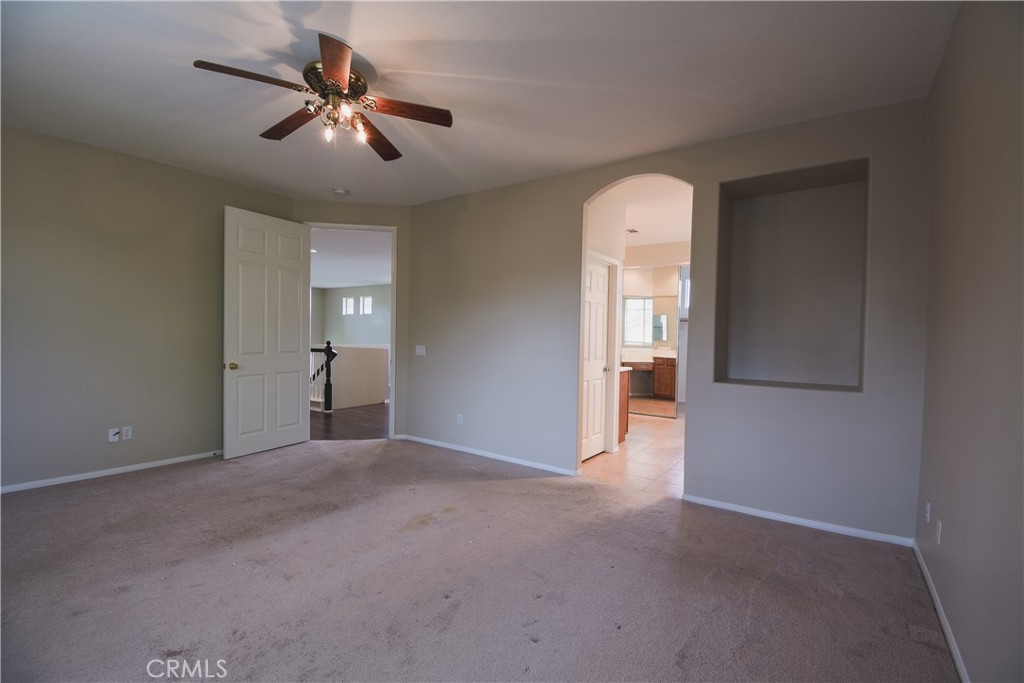 39705 Primrose Circle Murrieta, CA 92563 - Photo 20 of 31 wooden floor in an empty room with a window
