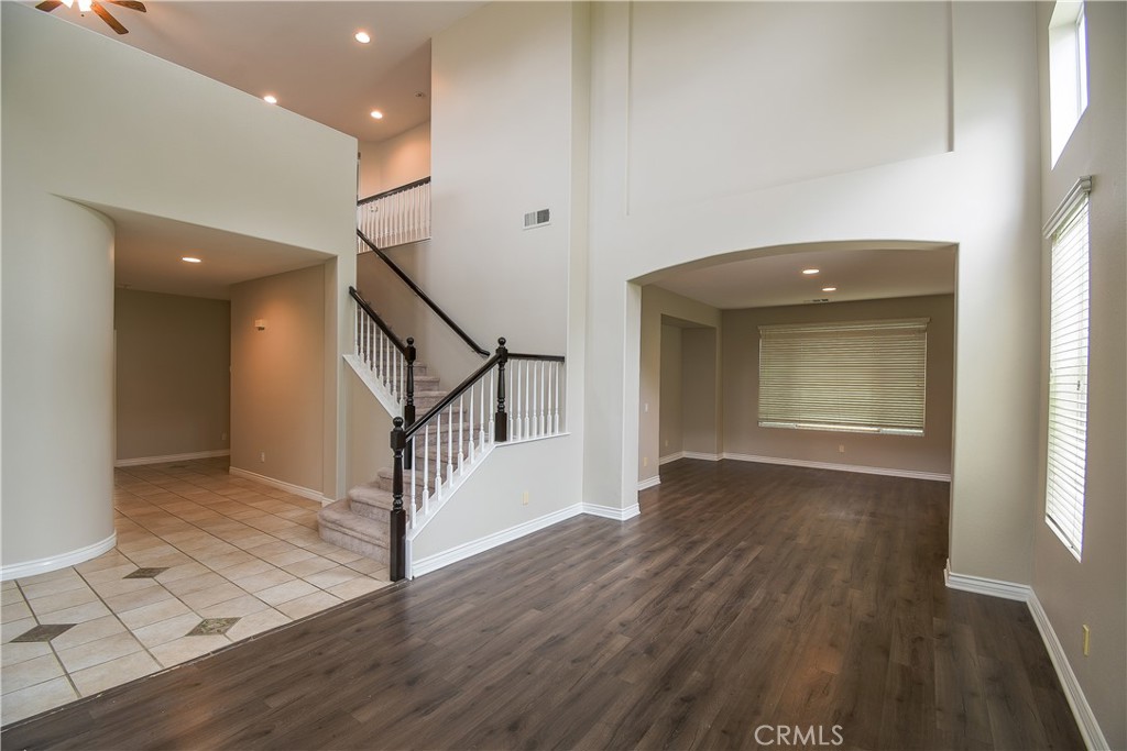 39705 Primrose Circle Murrieta, CA 92563 - Photo 2 of 31 wooden floor in an empty room with a window