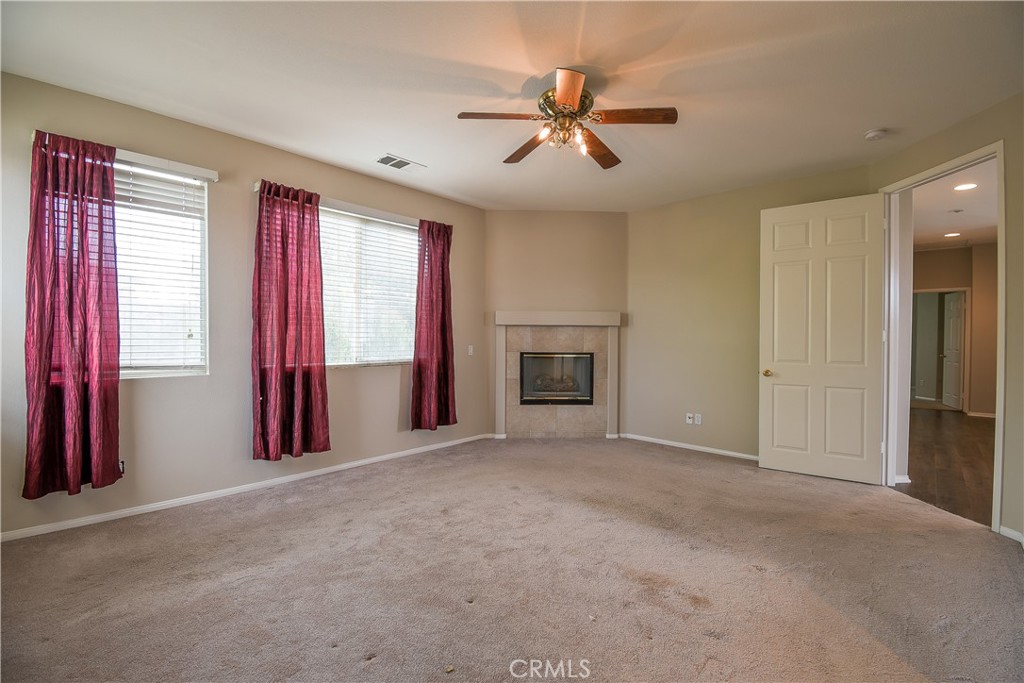 39705 Primrose Circle Murrieta, CA 92563 - Photo 21 of 31 a view of empty room with windows