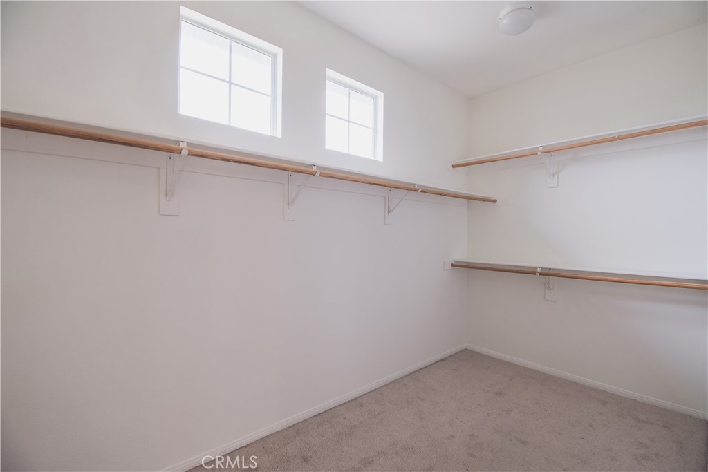 39705 Primrose Circle Murrieta, CA 92563 - Photo 24 of 31 a view of an empty walk in closet
