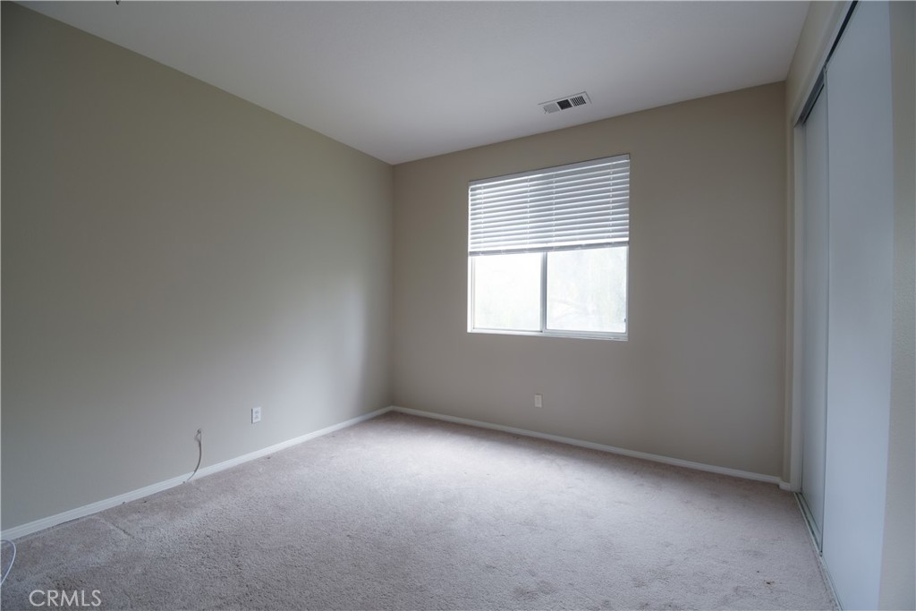 39705 Primrose Circle Murrieta, CA 92563 - Photo 25 of 31 an empty room with a window