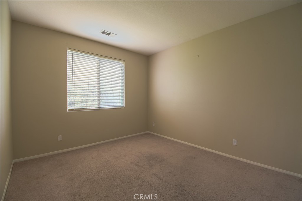39705 Primrose Circle Murrieta, CA 92563 - Photo 28 of 31 an empty room with a window