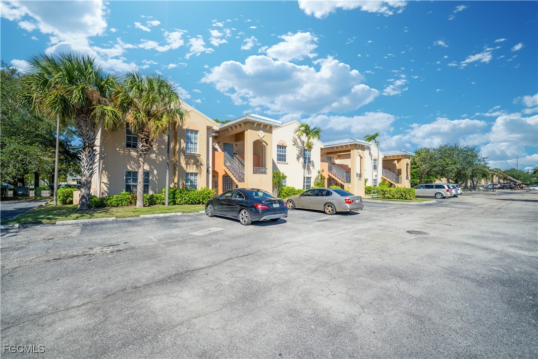 4172 Castilla Circle, Unit 201 Fort Myers, FL 33916 - Photo 19 of 34 a view of a street with houses