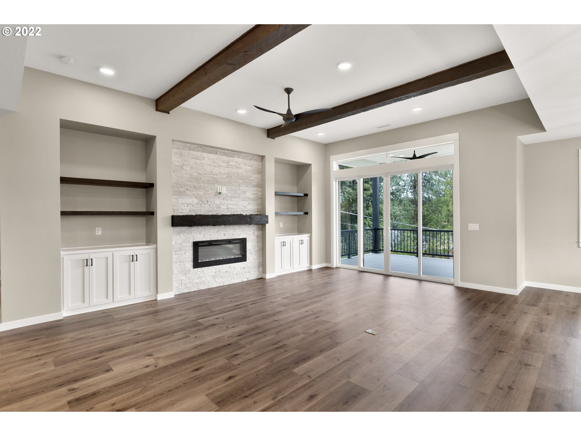 4118 South Hay Field Circle Ridgefield, WA 98642 - Photo 12 of 19 a view of an empty room with a window and wooden floor