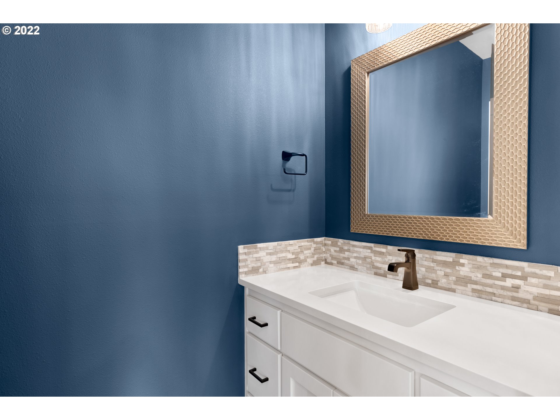 4118 South Hay Field Circle Ridgefield, WA 98642 - Photo 16 of 19 a bathroom with a sink and a mirror