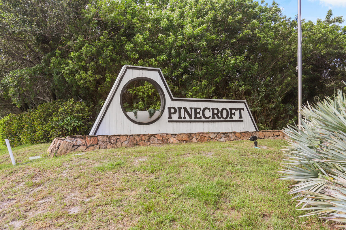 8356 Southeast Croft Circle, Unit O3 Hobe Sound, FL 33455 - Photo 16 of 23 a view of a house with a garden