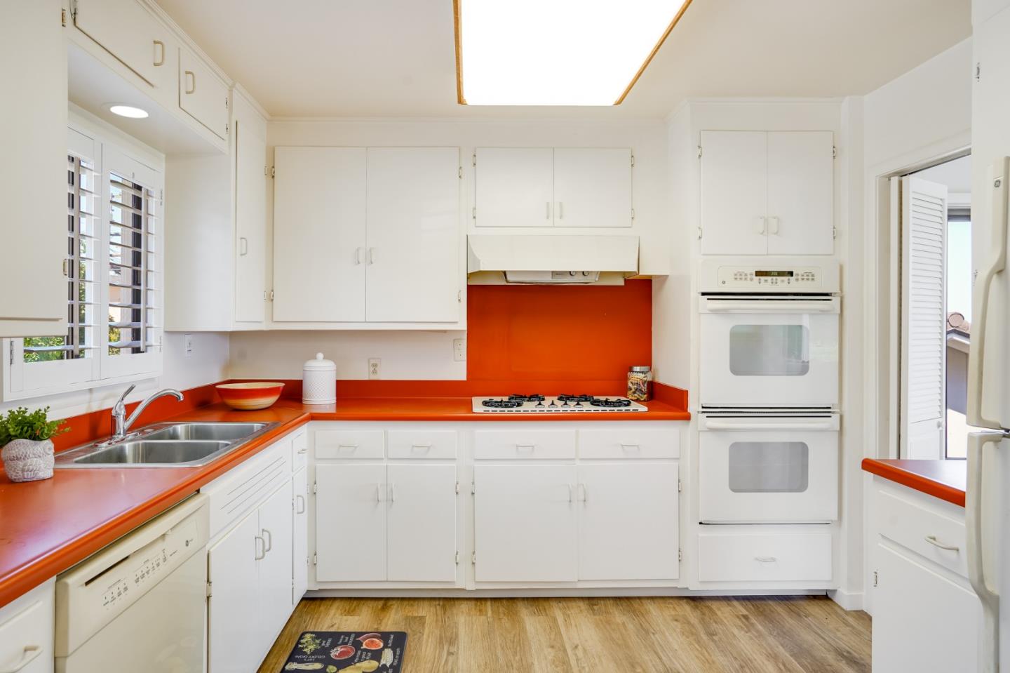 1273 Vista Grande Millbrae, CA 94030 - Photo 12 of 50 a kitchen with stainless steel appliances granite countertop a sink and cabinets