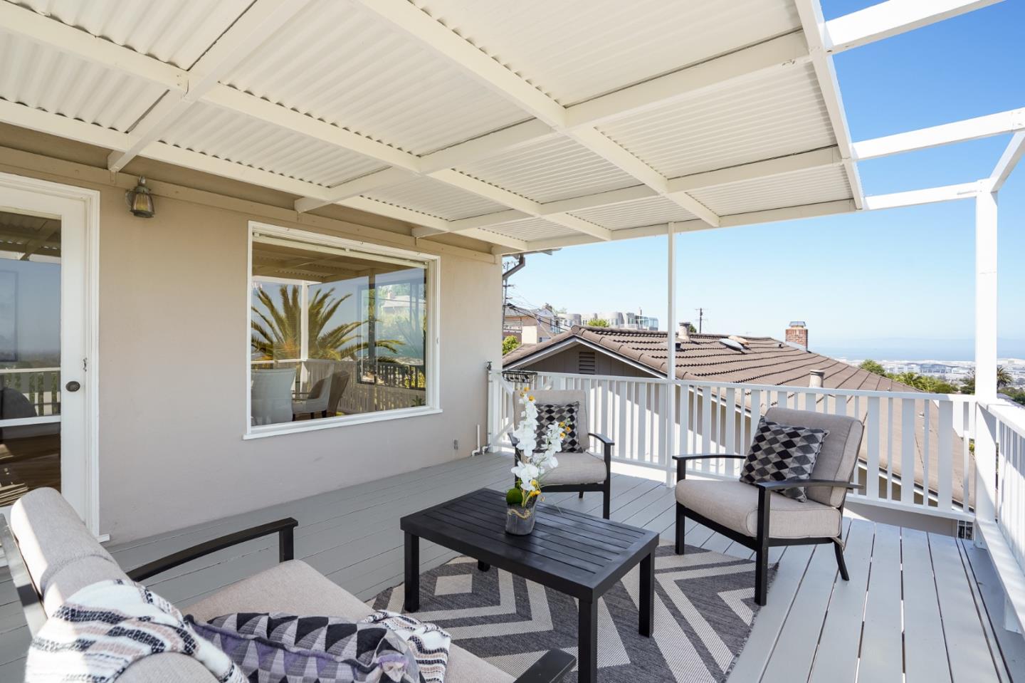 1273 Vista Grande Millbrae, CA 94030 - Photo 15 of 50 a view of a patio with a table and chairs