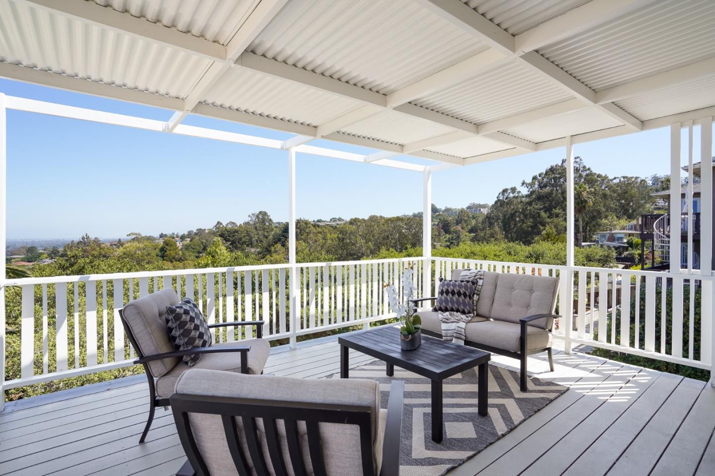 1273 Vista Grande Millbrae, CA 94030 - Photo 16 of 50 a roof deck with couches and wooden floor