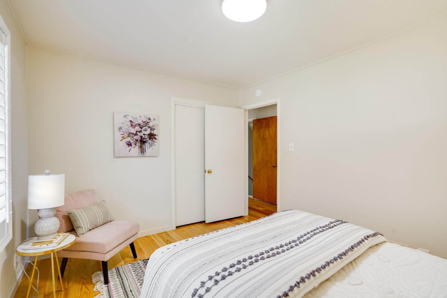 1273 Vista Grande Millbrae, CA 94030 - Photo 21 of 50 a bedroom with a bed and a lamp