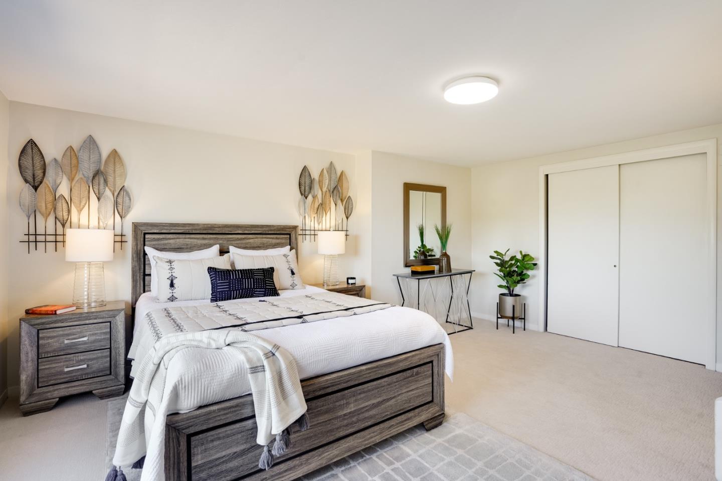 1273 Vista Grande Millbrae, CA 94030 - Photo 28 of 50 a bedroom with a bed a couch and a window