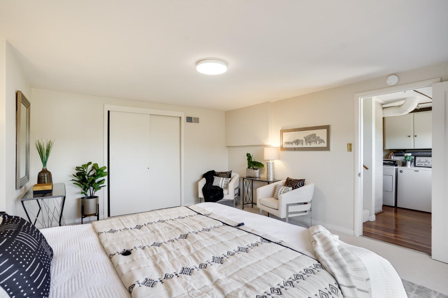 1273 Vista Grande Millbrae, CA 94030 - Photo 30 of 50 a bedroom with a bed and a dresser