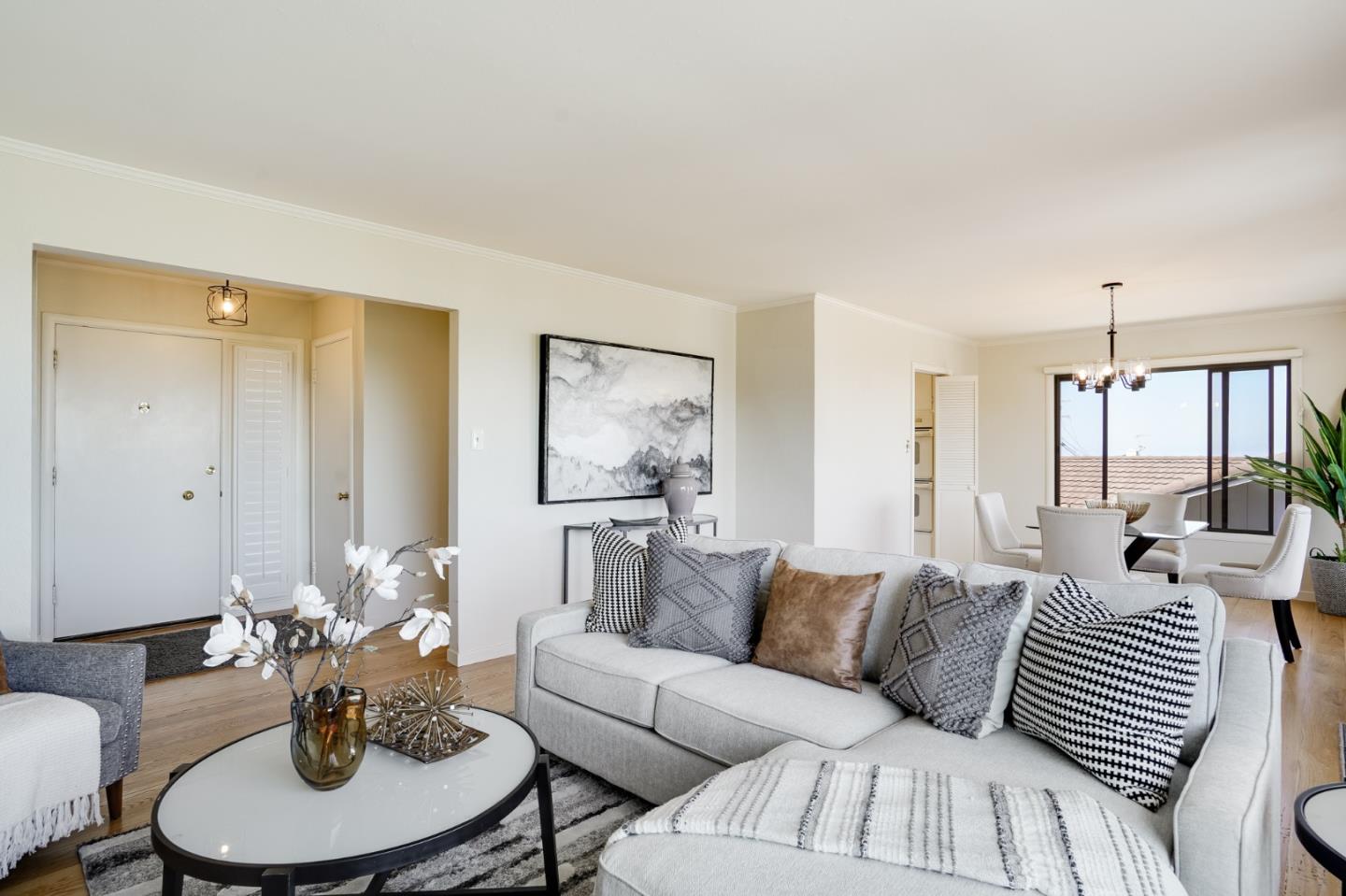 1273 Vista Grande Millbrae, CA 94030 - Photo 6 of 50 a living room with furniture a large window and a dining table