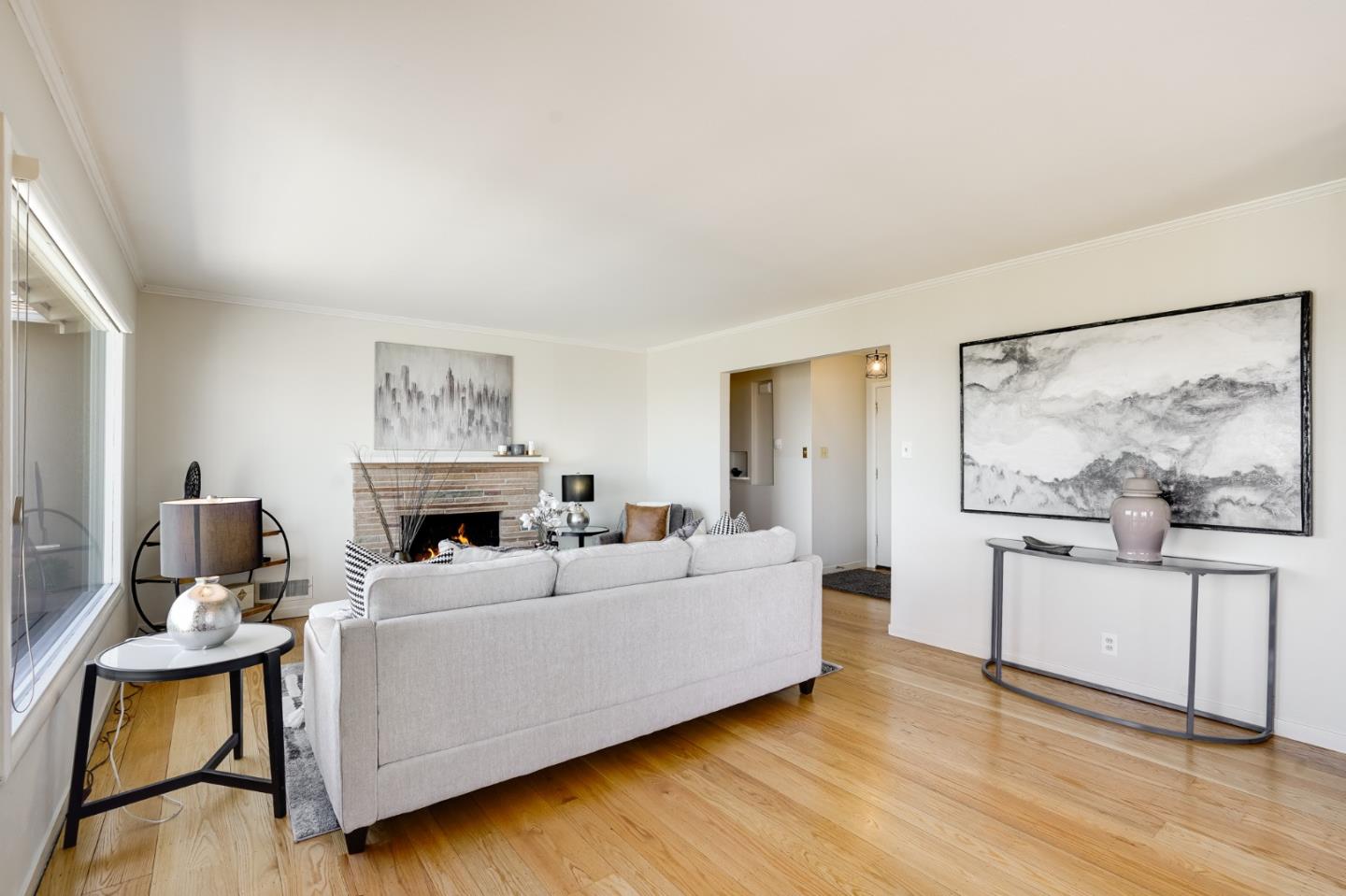 1273 Vista Grande Millbrae, CA 94030 - Photo 7 of 50 a living room with furniture and a painting