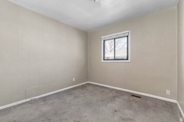 7689 Locust Street Midvale, UT 84047 - Photo 7 of 26 Main level, Bedroom 1