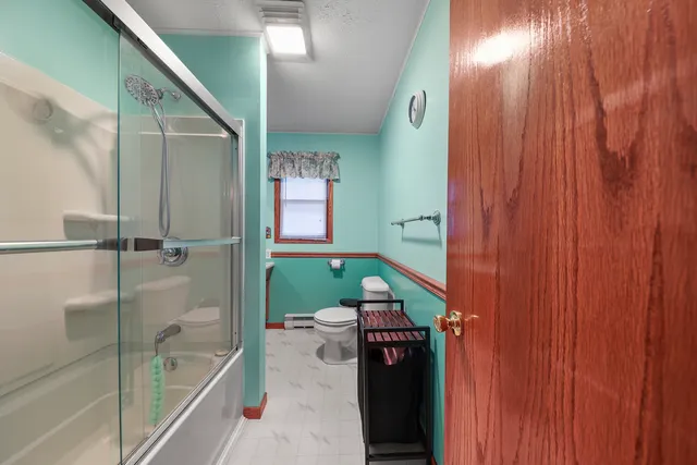 a room with window and a ceiling fan