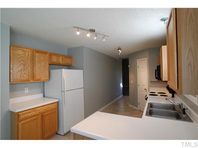 4300 Standing Rock Way Raleigh, NC 27604 - Photo 5 of 12 Spacious Kitchen with Lots of Cabinets & Counter Top Space.